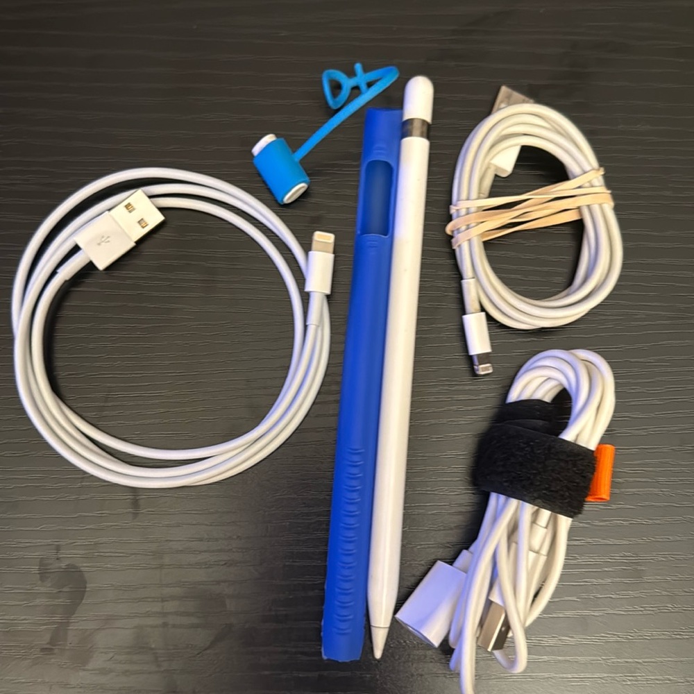 First gen Apple Pencil with charging cables